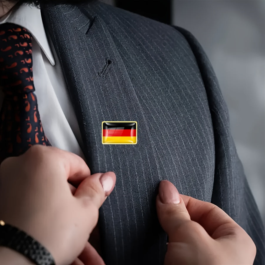 Collection of twenty vintage German flag lapel pins made from alloy squares.