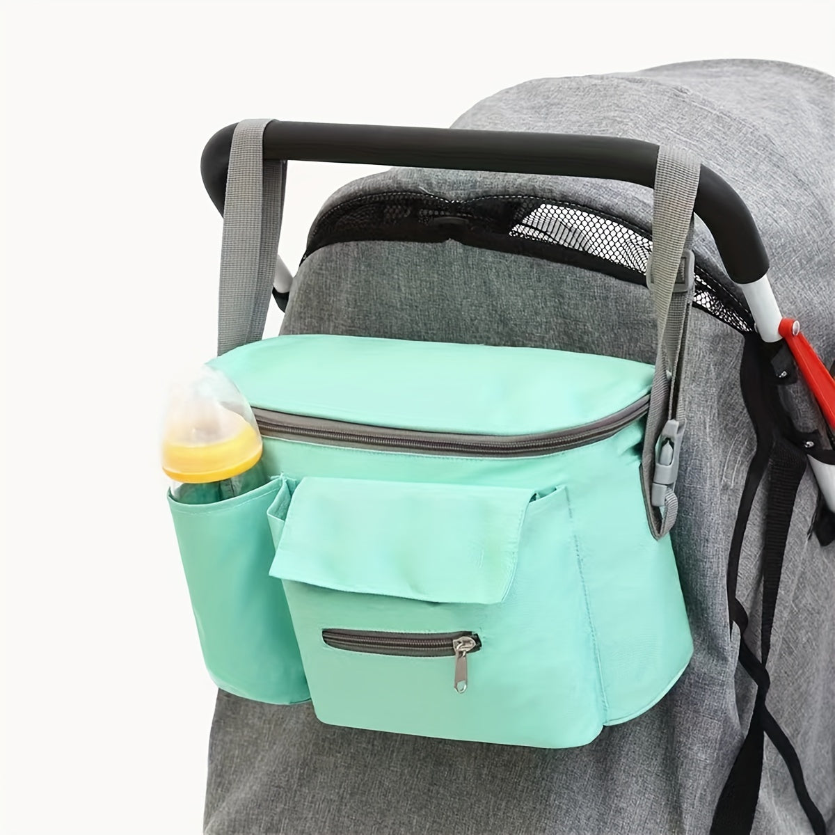 Durable, stylish stroller organizer with a large capacity, made of polyester material, featuring multiple functions, storage pockets, and a shoulder strap.