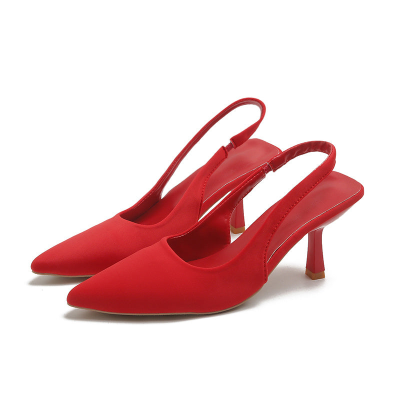 Women's slingback high heels with a solid color pointed toe slip-on stiletto design, suitable for various occasions.