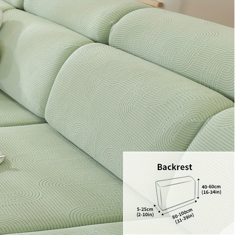 Jacquard sofa slipcover with universal fit and elastic design for furniture protection and home decor in any room.