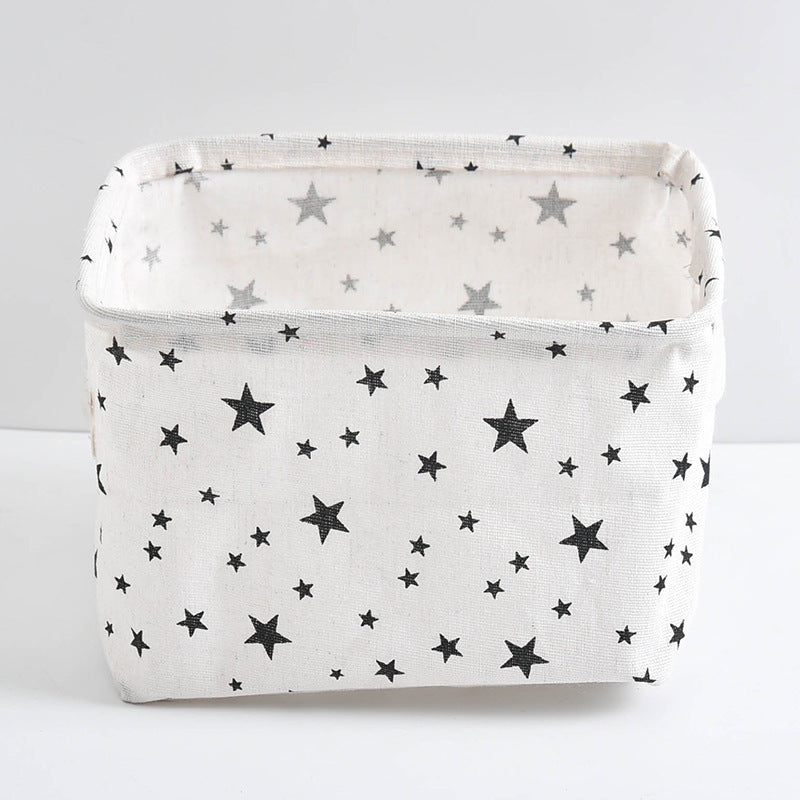 Waterproof desktop storage box made of printed cotton and linen with handle, suitable for organizing sundries.