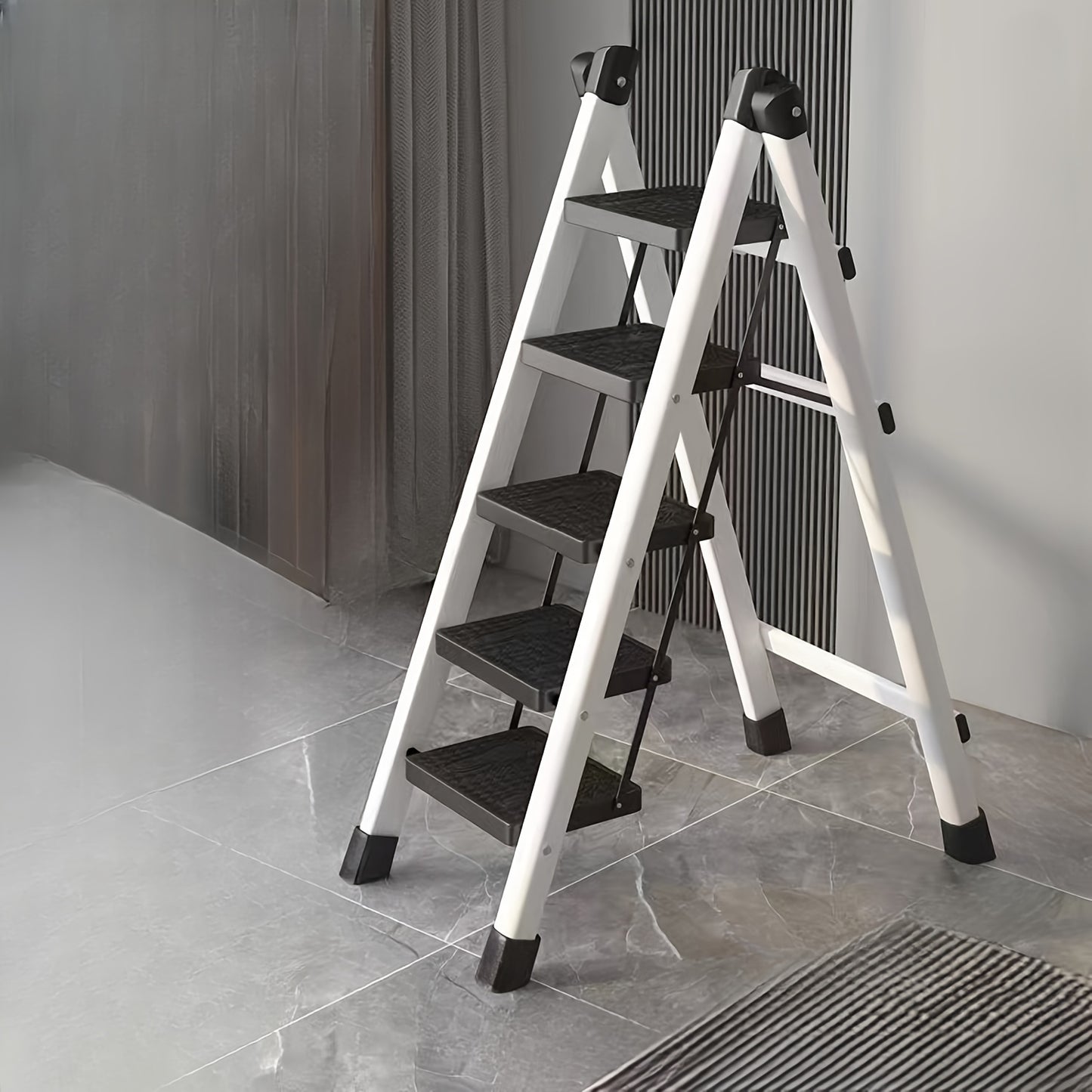 Lightweight folding step ladder for household use with wide, non-slip pedals. Suitable for adults.