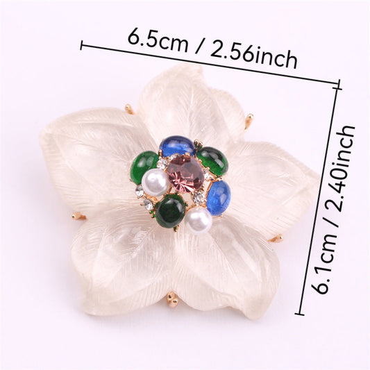 One piece of a luxurious iridescent floral brooch pin adorned with rhinestones. This elegant accessory features a novel simulated modeling design, making it a versatile fashion addition to clothing, bags, and hats.