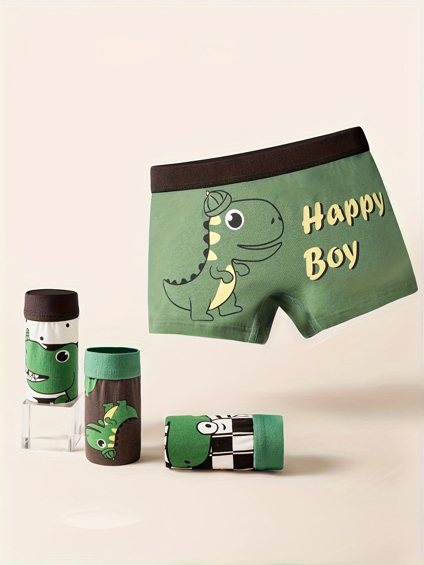 4 children's boxer briefs with cute dinosaur print, made of soft breathable cotton, suitable for all seasons.