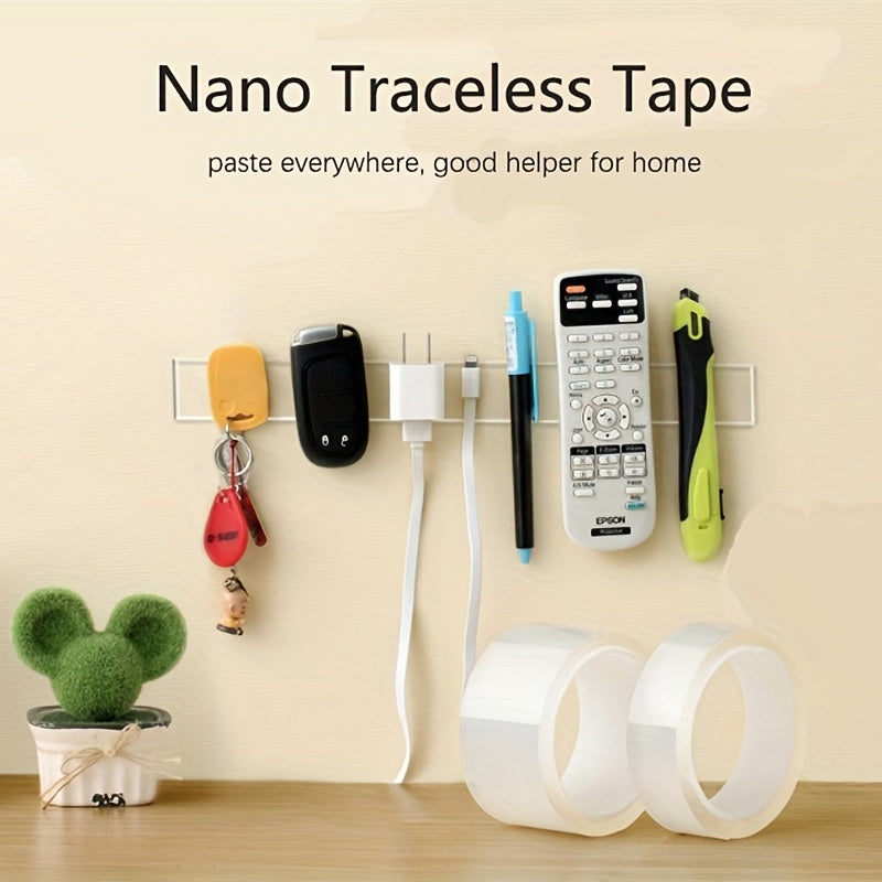 Transparent double sided nano tape for waterproof wall stickers, reusable and heat resistant for home decoration. Strong adhesive strips for multipurpose mounting needs.