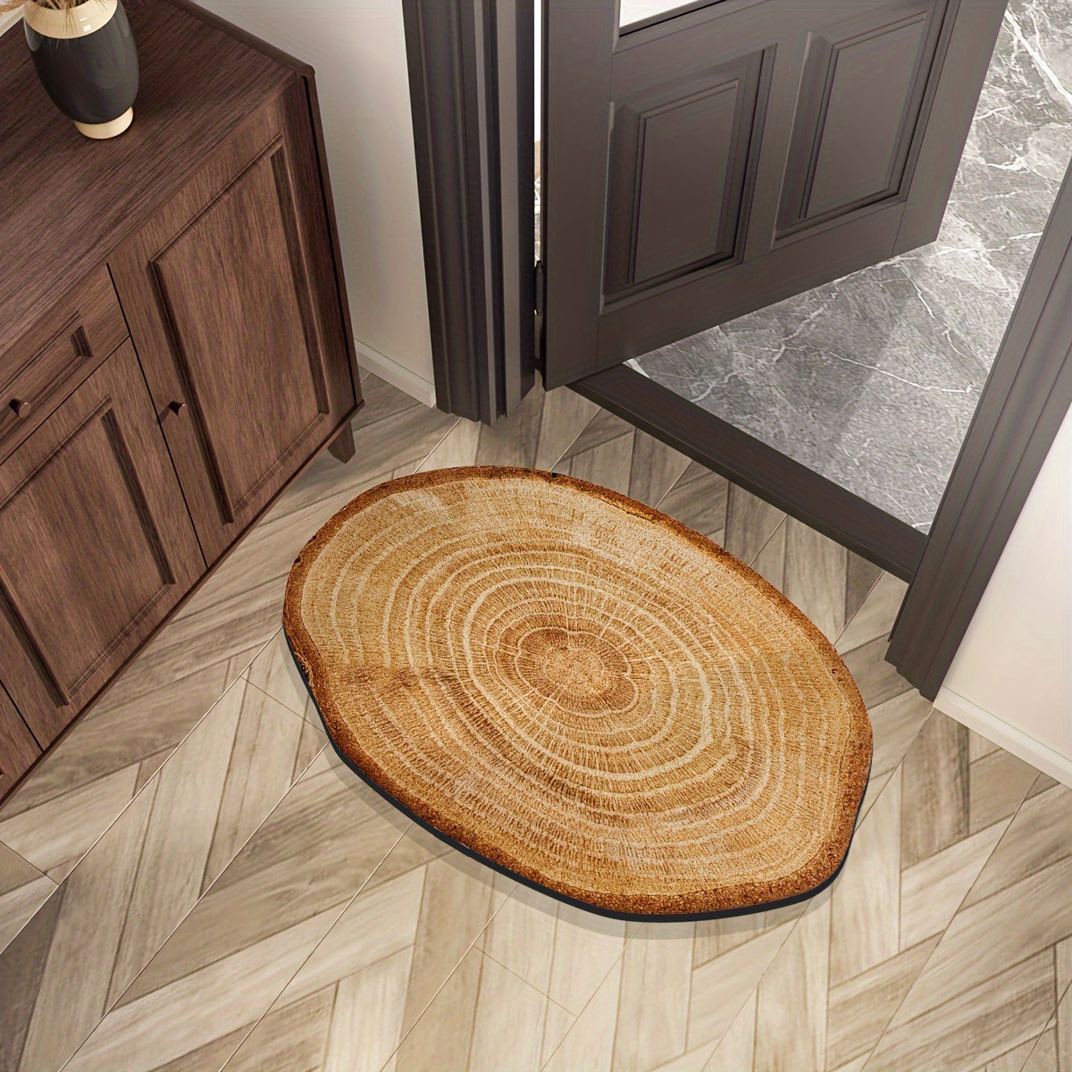 Wood Grain Tree Ring Design Indoor Doormat featuring a non-slip rubber backing for added safety. This decorative floor mat is made from machine-made polyester and is hand-washable. The low pile entry rug is flame resistant, making it perfect for use in