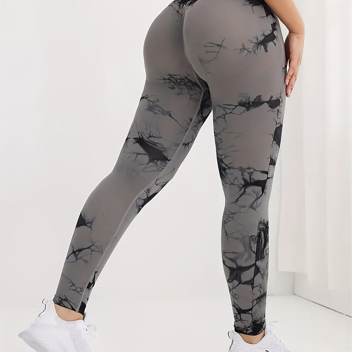 High-waist Peach Lift Tie-Dye Yoga Leggings made of seamless, stretchy & breathable nylon/elastane blend for women. Machine washable.