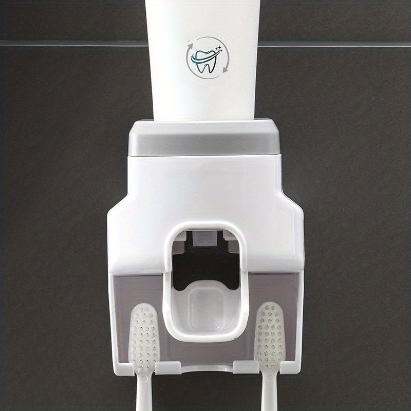 Wall mounted toothbrush holder and toothpaste dispenser with automatic squeezer, ideal for family washroom.