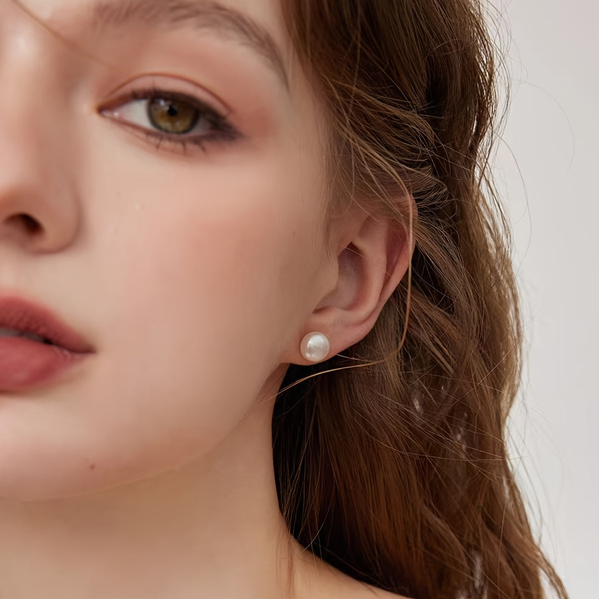 Elegant Natural Freshwater Cultured Pearl Earrings: 7-8mm/0.7-0.8cm in size, with a minimalist design perfect for daily wear, holiday gifts, and special occasions. Ideal for those born in June. Features stainless steel posts and no need for an external