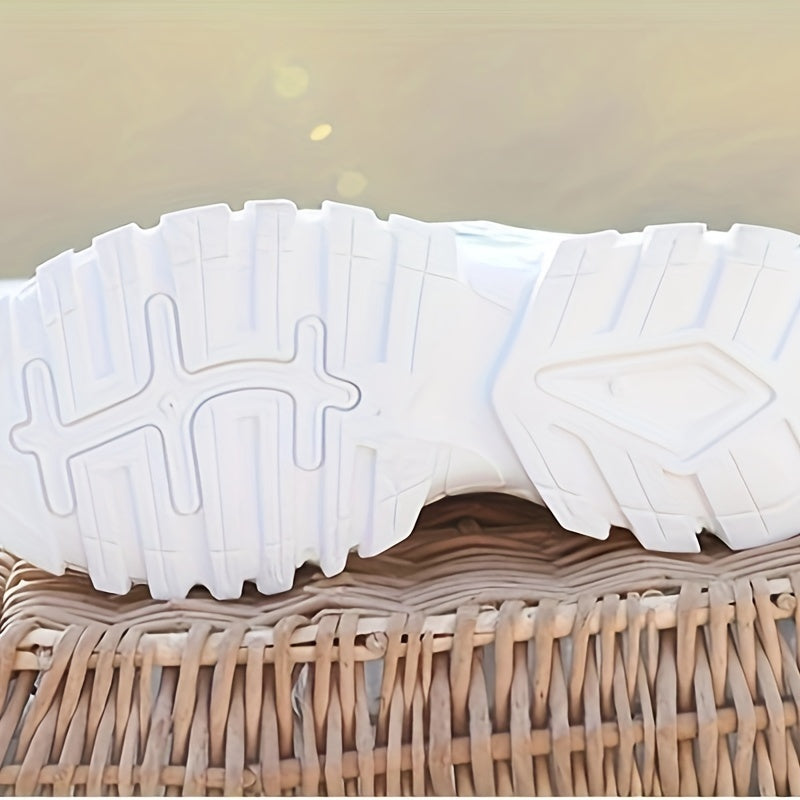 Women's white sneakers with low top lace-up, mesh upper, breathable fabric insole, and durable PVC sole for casual and sporty wear. Casual and trendy footwear.