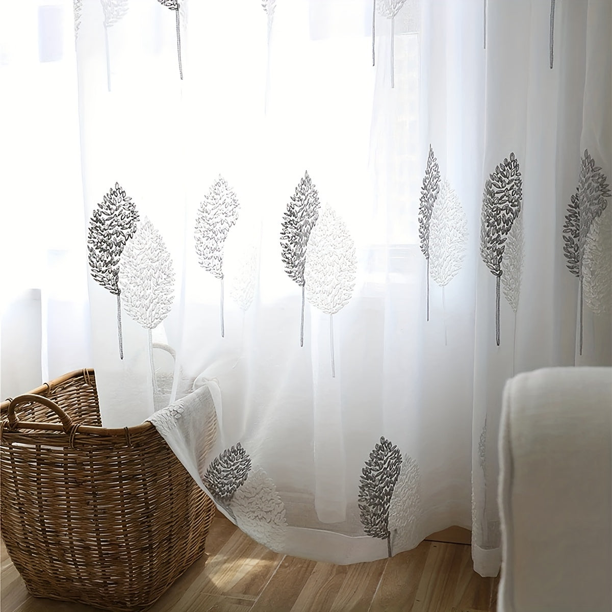 Add a touch of pastoral elegance to your home with this beautiful sheer curtain featuring delicate leaf embroidery. This translucent tulle curtain is easy to hang with a rod pocket design, perfect for adding a subtle touch of style to your living room or