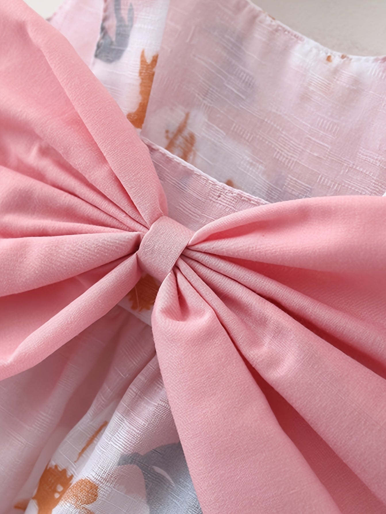 Summer dress with flower print, big bow, and matching hat set for baby girls.