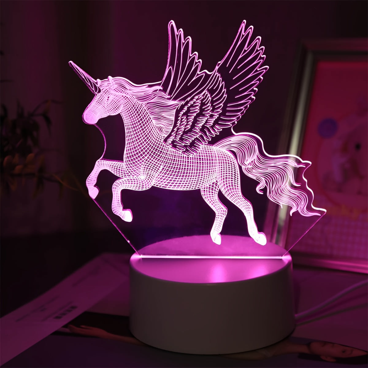 Pink unicorn night light for kids' bedrooms.