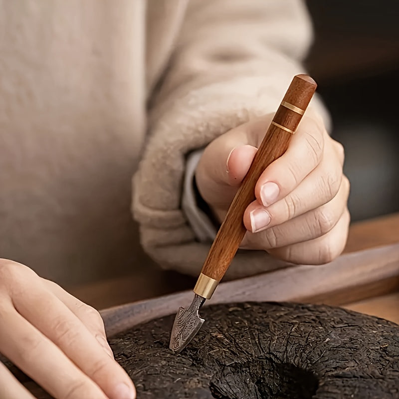 A set of handmade Damascus steel tea knife, stainless steel Pu-erh tea cutter, and tea brick opener, along with a wooden tea tool set for Matcha, perfect for home kitchen accessories.