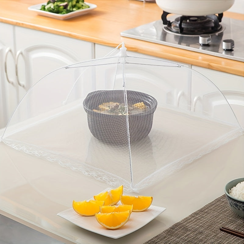 Lace mesh food cover that pops up like an umbrella to protect food from dust, reusable and collapsible design for table, kitchen utensil.