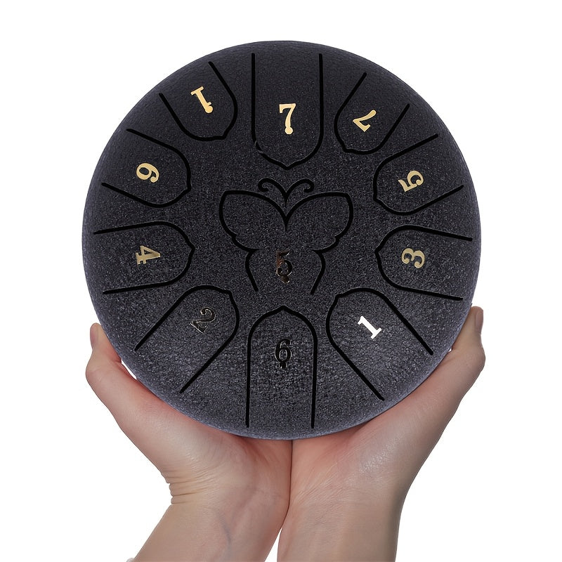 Steel Tongue Drum with 11 Notes, 15.24 cm for Sound Healing and Meditation, includes Carry Bag, Music Book, Sticks, and Accessories.