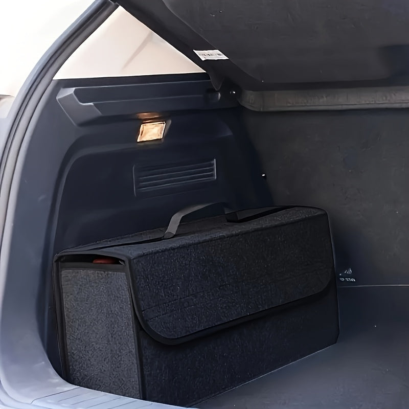 Portable foldable car organizer made of felt cloth for universal fit and interior stowing in vehicles.