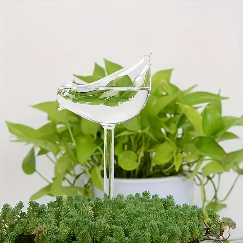 5 bird-shaped self-watering globes for indoor and outdoor plants.