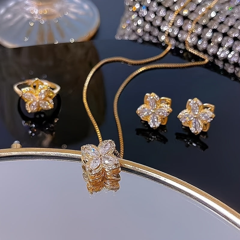 Get the stunning 4-piece Luxury Elegant Jewelry Set, featuring 18K Golden Plated Titanium Steel and sparkling Synthetic Cubic Zirconia. This set includes a Rotatable Pendant Necklace, Ring, and Earrings, perfect for daily wear, parties, and gift-giving.