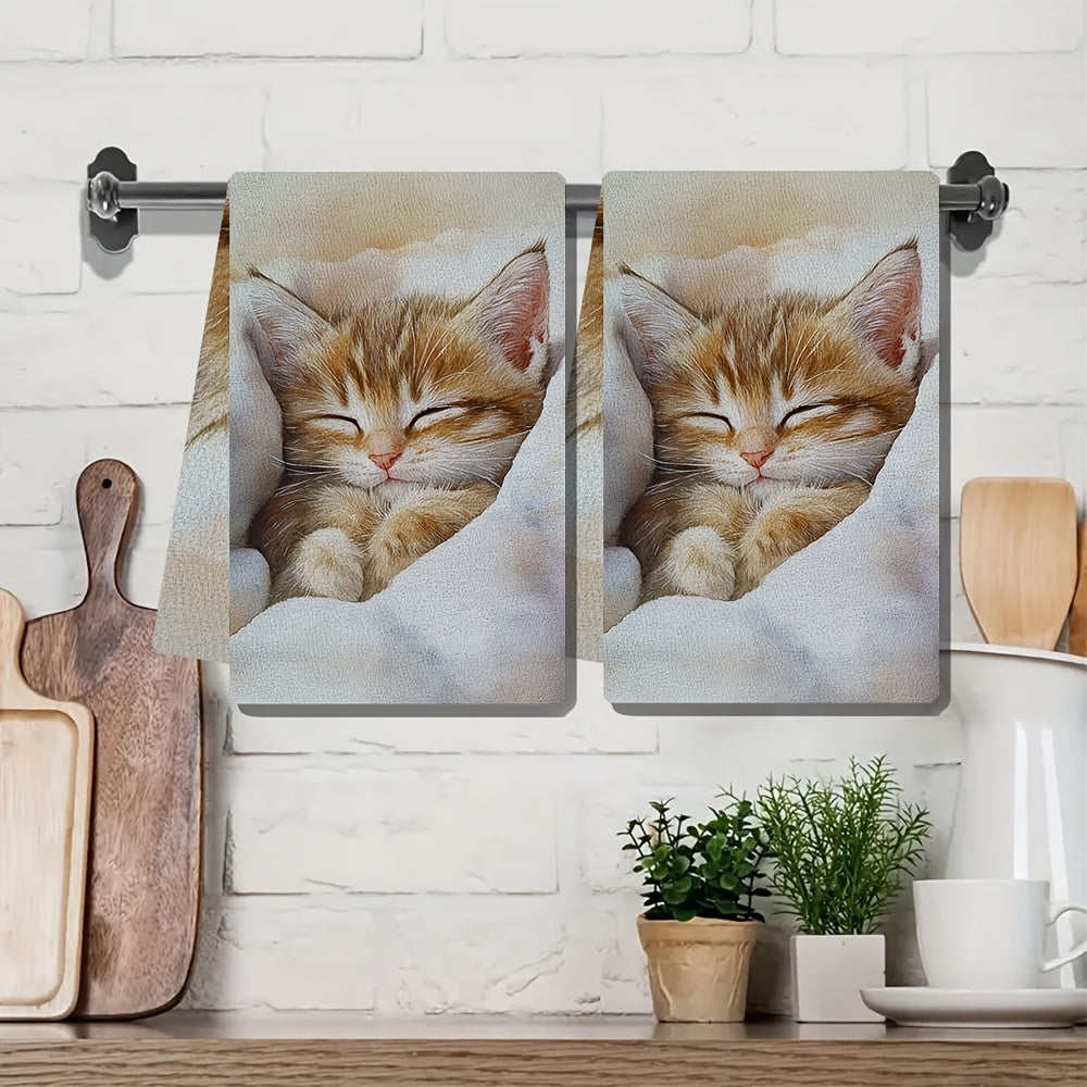 This collection includes 2 ultra-soft kitchen towels with a delightful design of a waking kitten, known for its gentle purring. These towels are highly absorbent, perfect for drying dishes, and can also be used as holiday decorations. They are machine