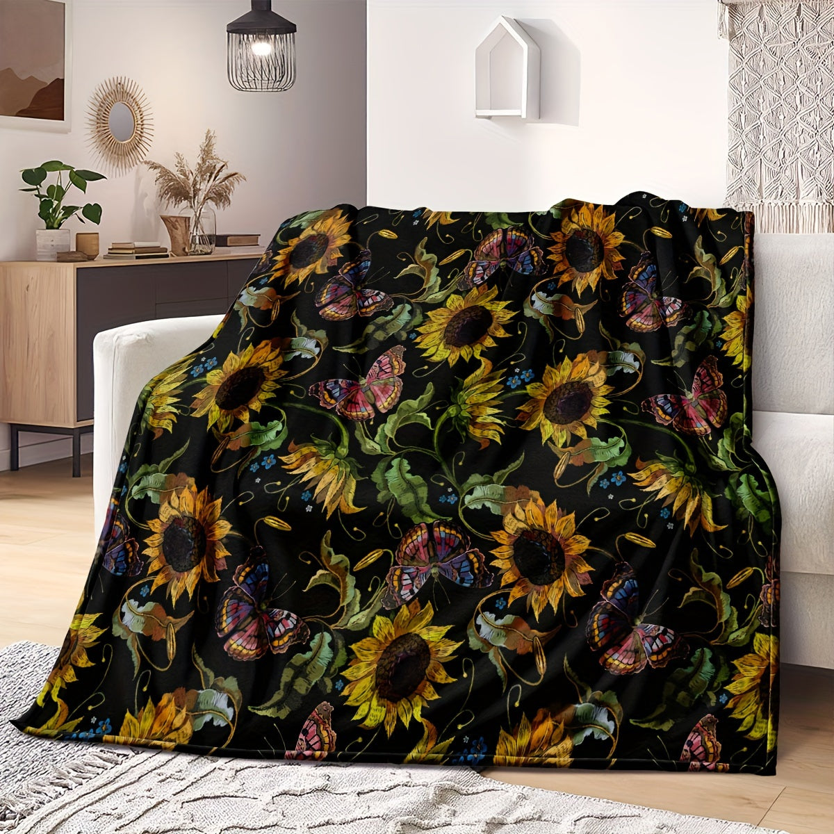 One piece of a Sunflower Throw Blanket made of soft and warm fleece, featuring an all-season floral pattern. This multi-use blanket is a perfect gift for use on the sofa, in the office, on the bed, or while camping. It is crafted from 250-300g superfine