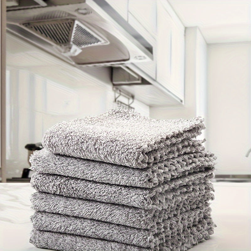 Keep your dishes spotless with our Bamboo Charcoal Fiber Dishwashing Rag - Say goodbye to oil stains and lint! This absorbent towel also doubles as a scouring pad for tough messes in the kitchen or car wash.