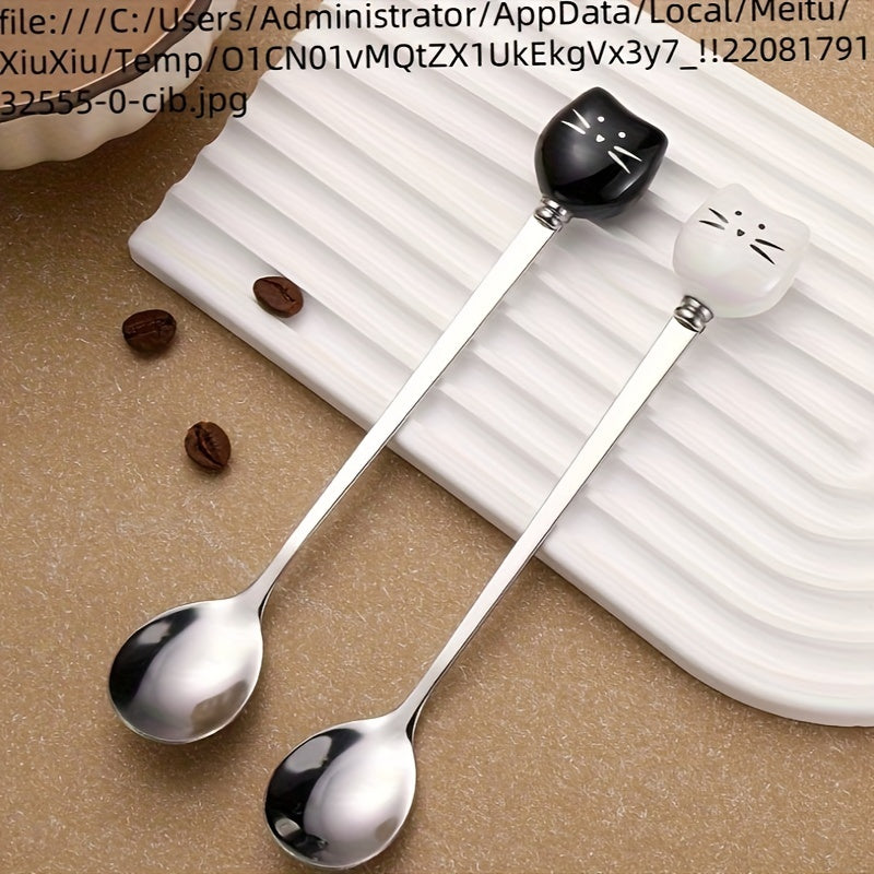 Charming stainless steel coffee stirrers with whimsical ceramic kitty spoons.