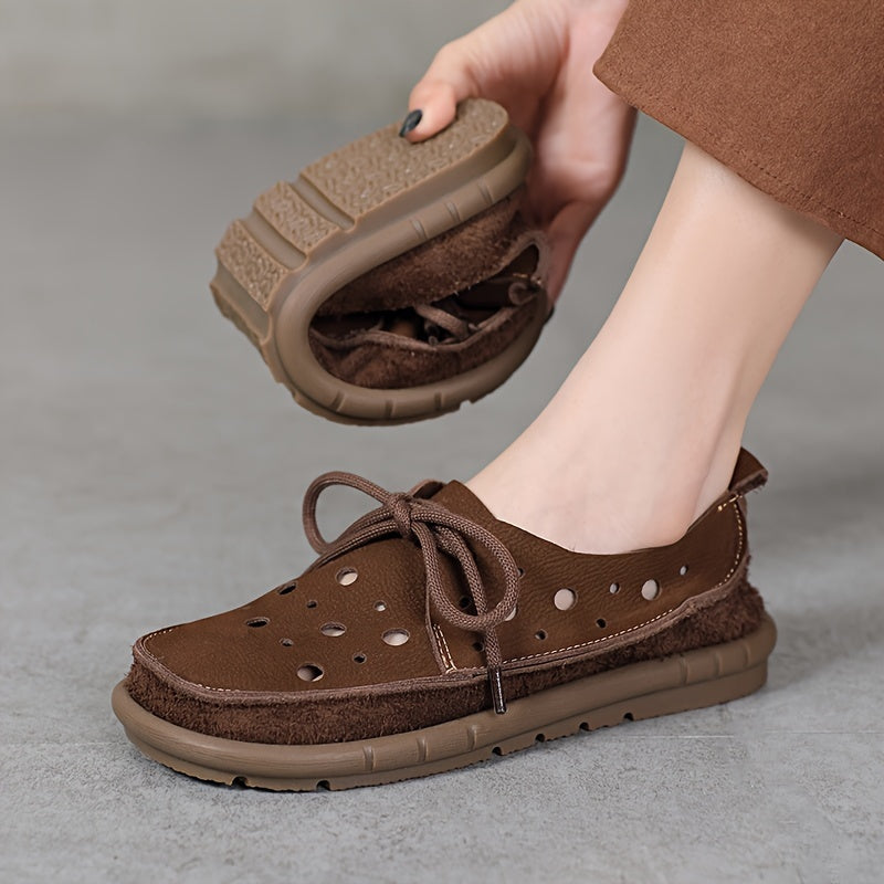 Genuine leather loafers with perforated design and lace-up closure, featuring a soft rubber sole for comfort. Brown leather shoes ideal for summer, offering breathability and style. Stylish