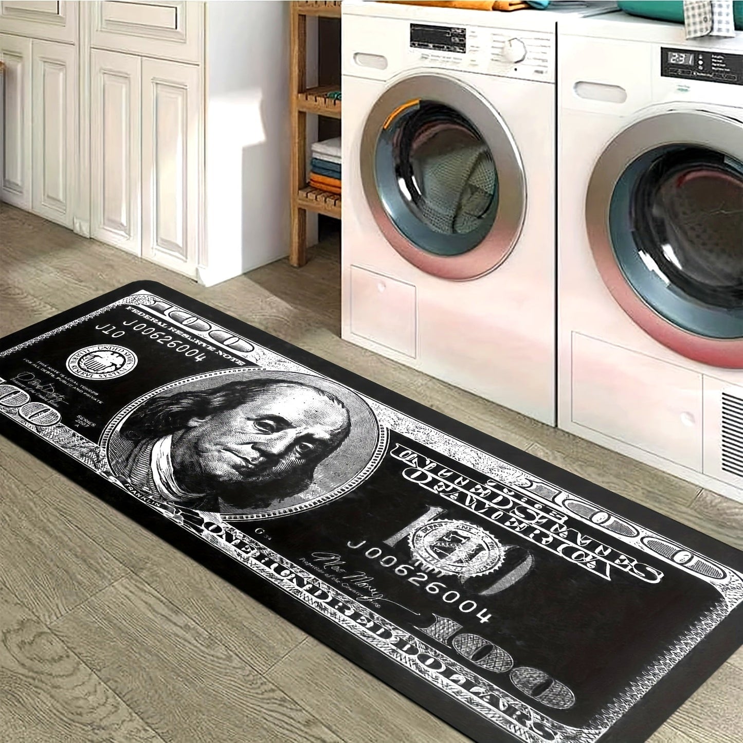 Transform your hallway with this stylish 1-piece Dollar Bill Runner Carpet in black and white. Perfect for adding a modern touch to your kitchen decor or bedroom, this non-skid rug is sure to enhance your home's ambiance.