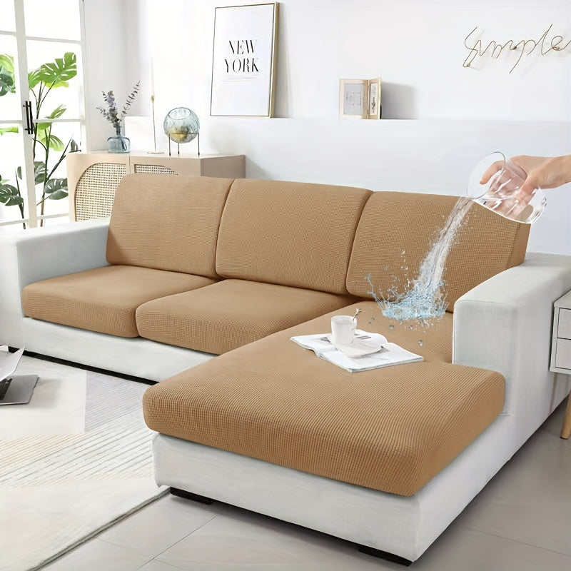 Modern Stretch Sofa Cover made of polyester and spandex blend. Machine washable with elastic band closure. Integrated design fits most sectional sofas in the living room.