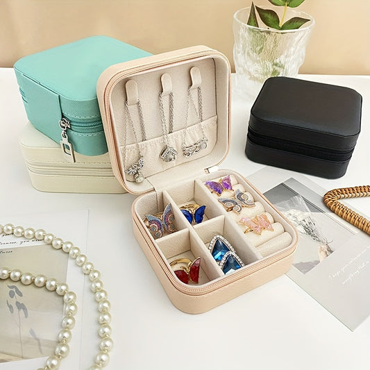 Compact faux leather jewelry organizer box for rings, necklaces, earrings & more. Portable travel case with multi-purpose storage solution. Rectangle shape for organizing.