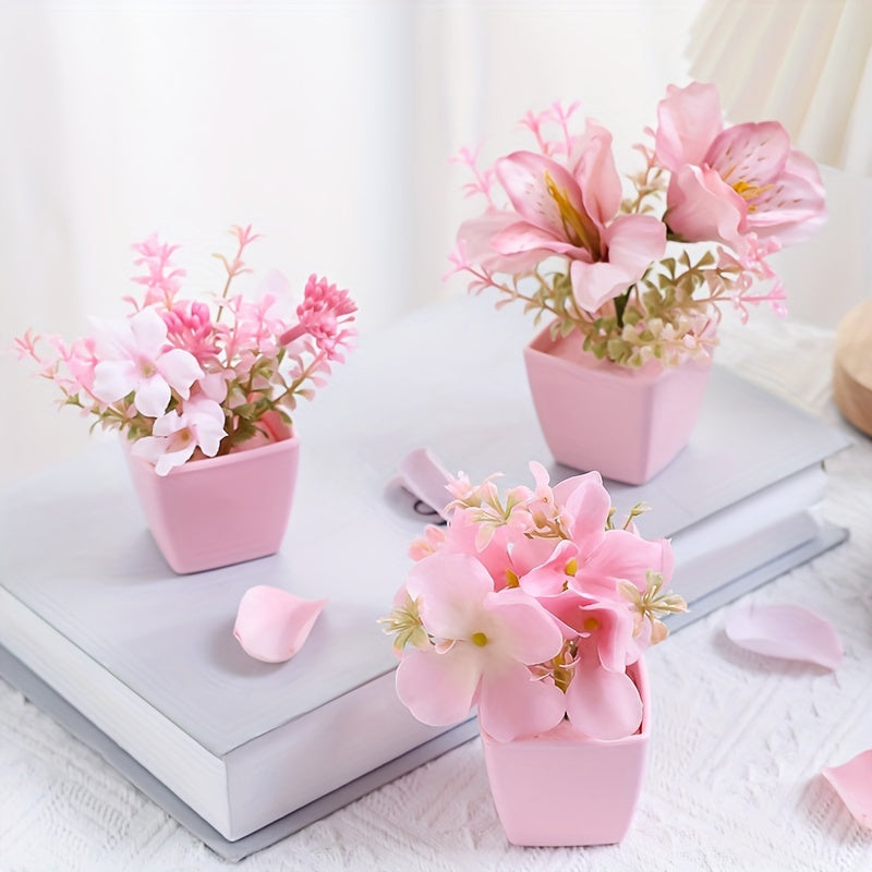 3 mini pink potted plants with faux rose and peach embroidered ball flowers for wedding, home, or office decoration.