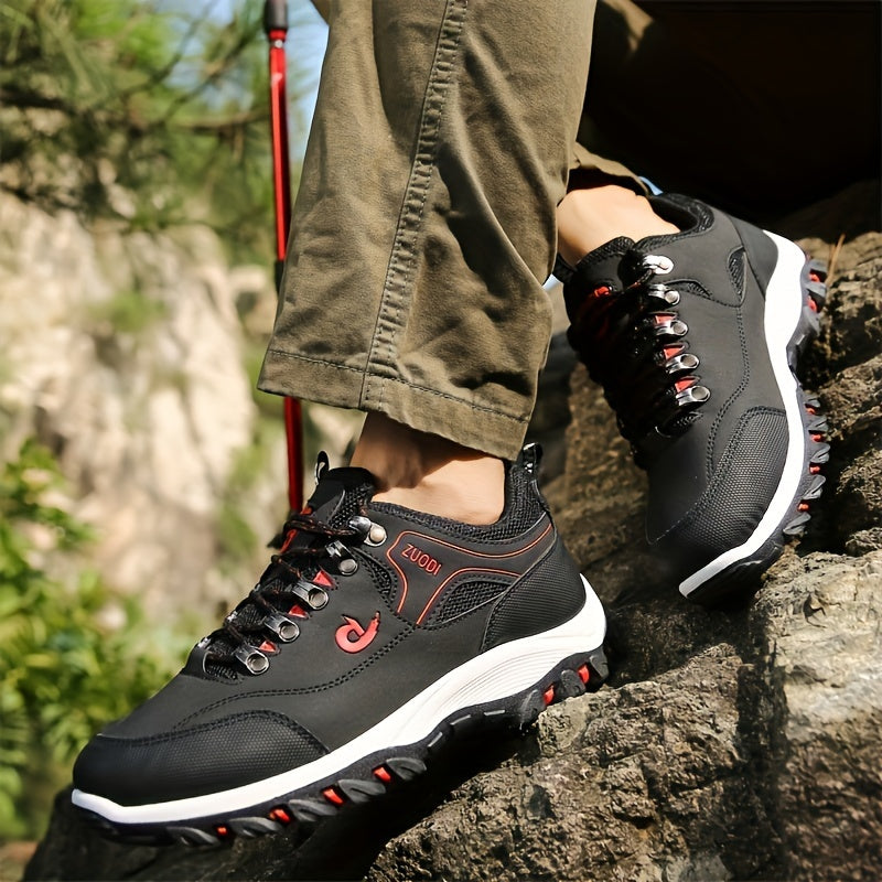 Large men's hiking boots and casual sports shoes with lace closure, solid color, lightweight design, and durable construction for outdoor activities.