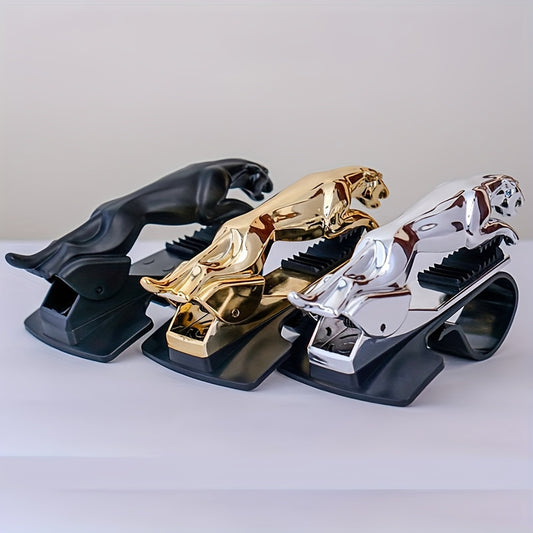 A versatile dashboard clip for the car, combining a phone holder and navigation stand, designed as a golden leopard.