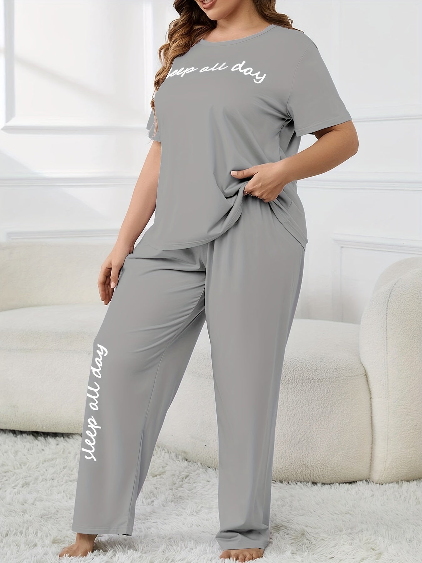 Cute plus-size pajama set with printed top and casual pants.