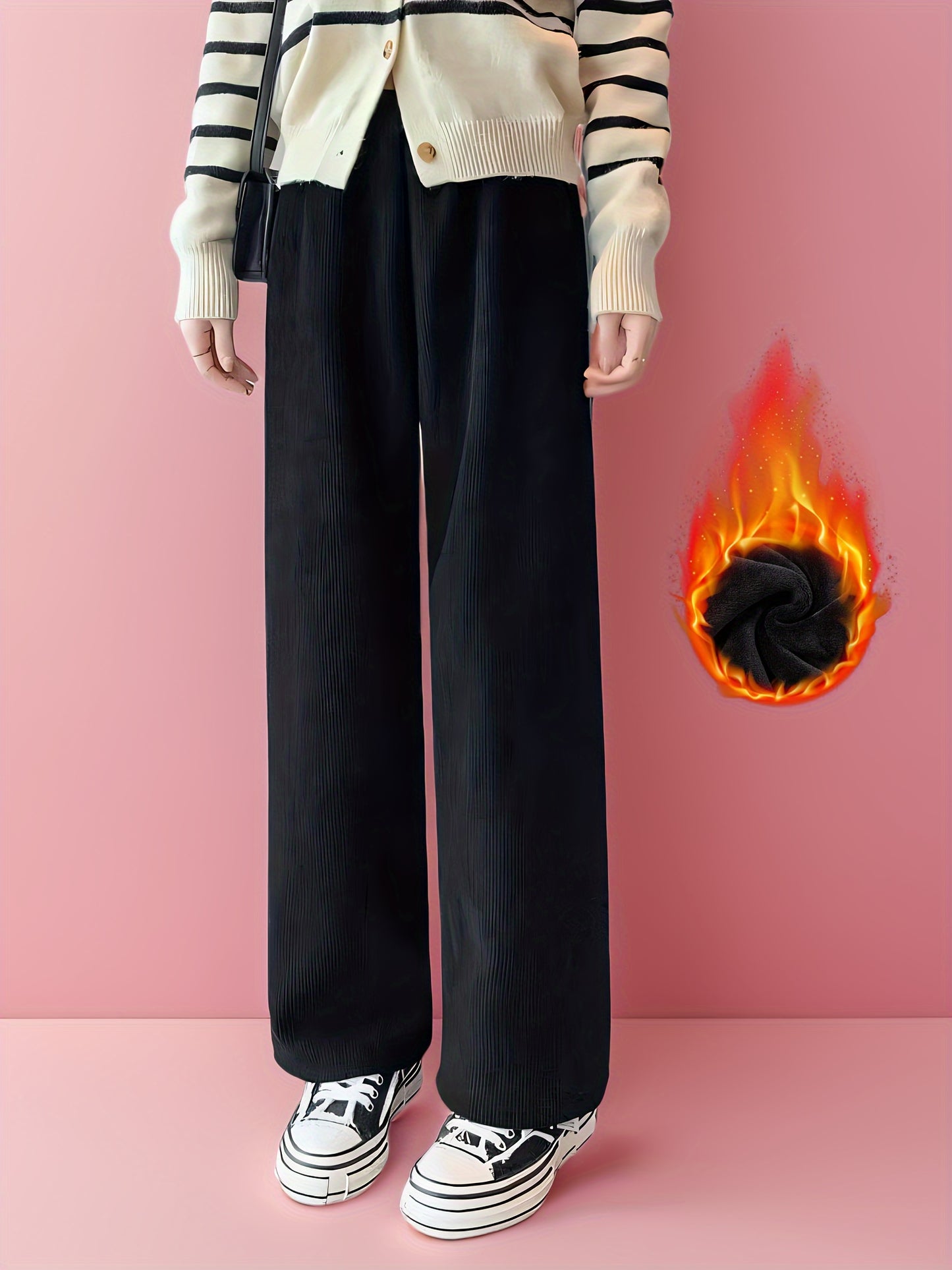 Warm and cozy fleece-lined winter pants for women, with wide legs and soft polyester blend for cold weather comfort.