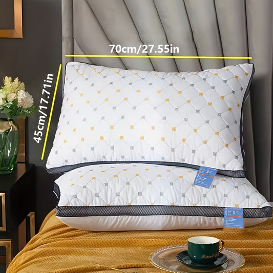 Two luxury hotel pillows made of soft polyester with high resiliency and breathable sleep support. Includes neck support for side and back sleepers. Dry clean only.