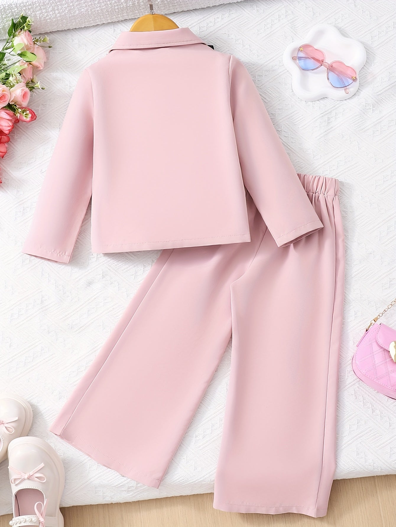 Stylish youth pantsuit with long sleeve jacket, bow detail, wide-leg trousers. Stretchy polyester, ideal for spring/fall outdoor occasions.