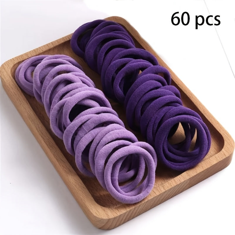 Solid color elastic hair rings in various quantities with anti-slip feature, suitable for daily use and holiday gifts.