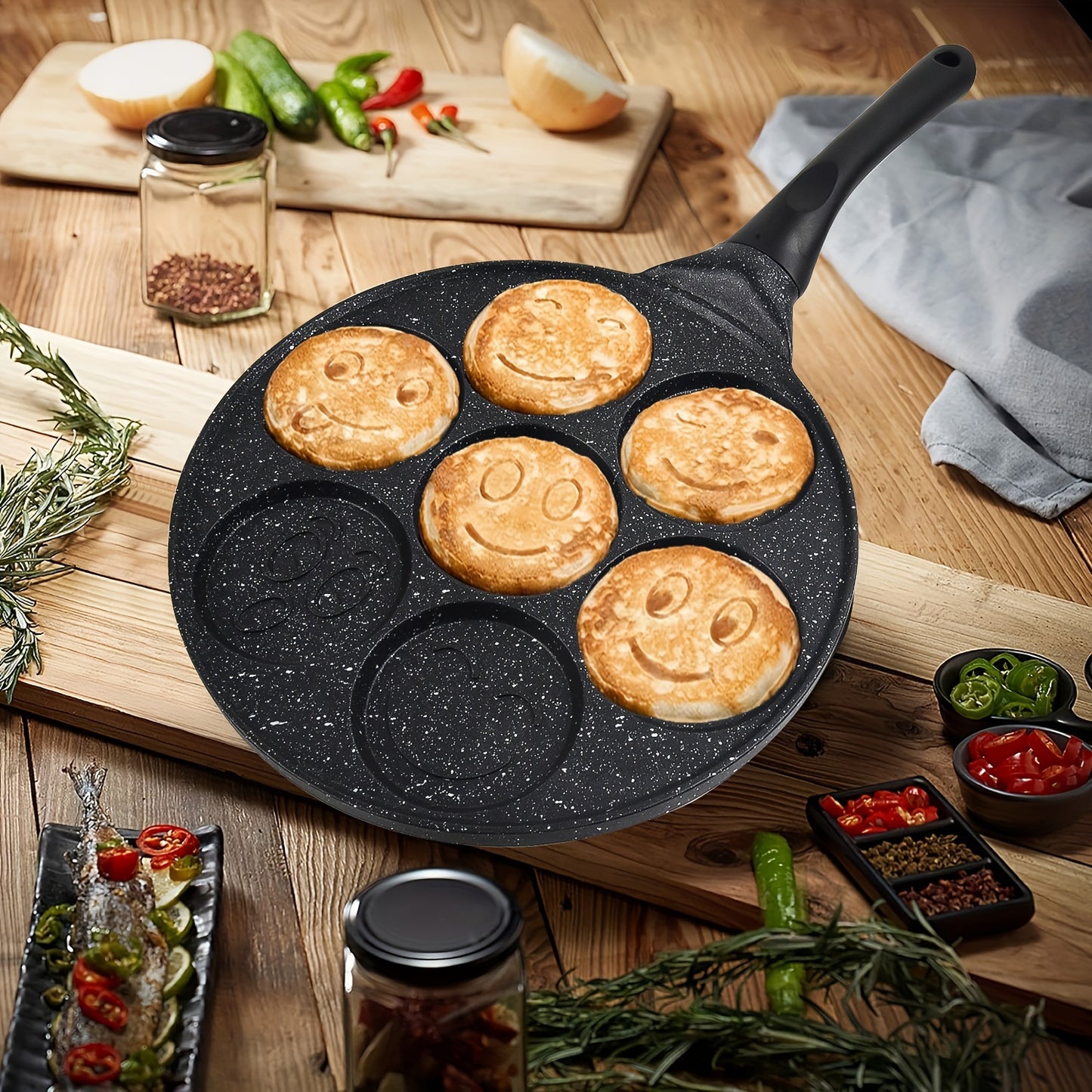 Non-stick pancake pan with 7 face molds for easy cleaning and perfect breakfasts.