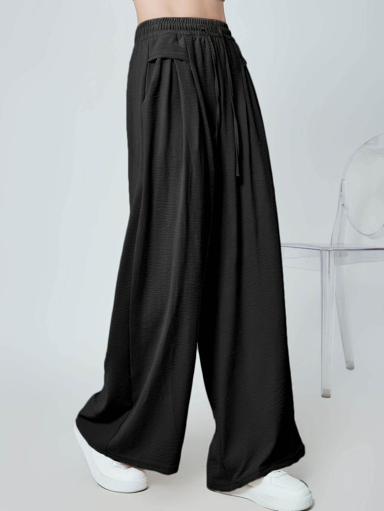 Stylish lounge bottoms with elastic drawstring, pleated detail, and wide leg fit for women's loungewear.