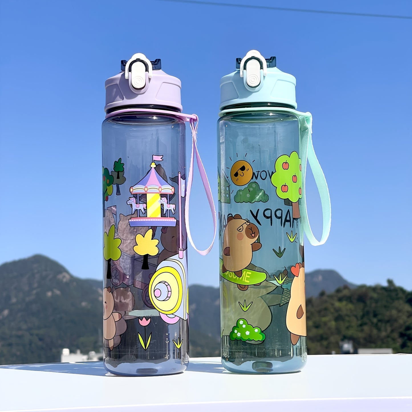 Adorable large sports water bottle with whimsical designs. Durable and portable, perfect for outdoor activities.