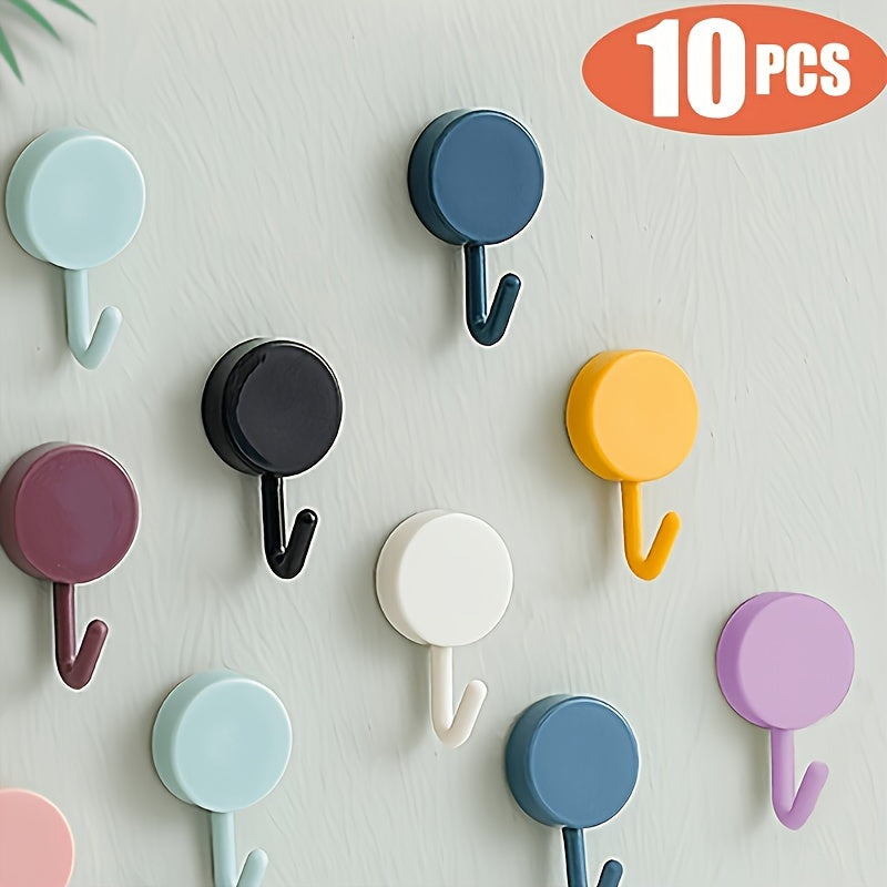 10 Adhesive wall hooks for keys, coats, and towels. Waterproof and self-adhesive for kitchen, bathroom, bedroom, and entrance door decor.