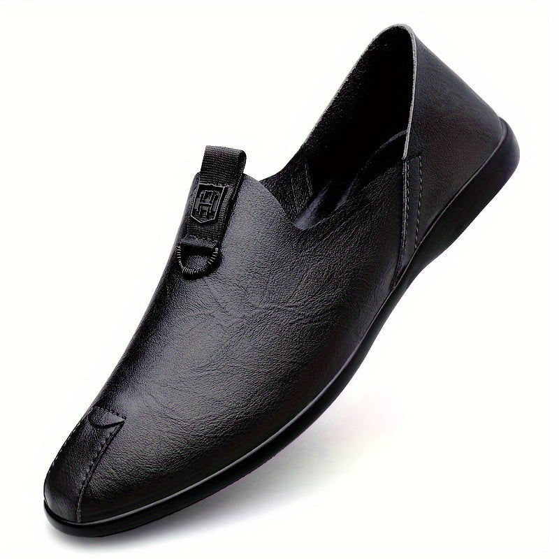 Sleek black slip-on shoes for men, breathable and fashionable with a durable sole.