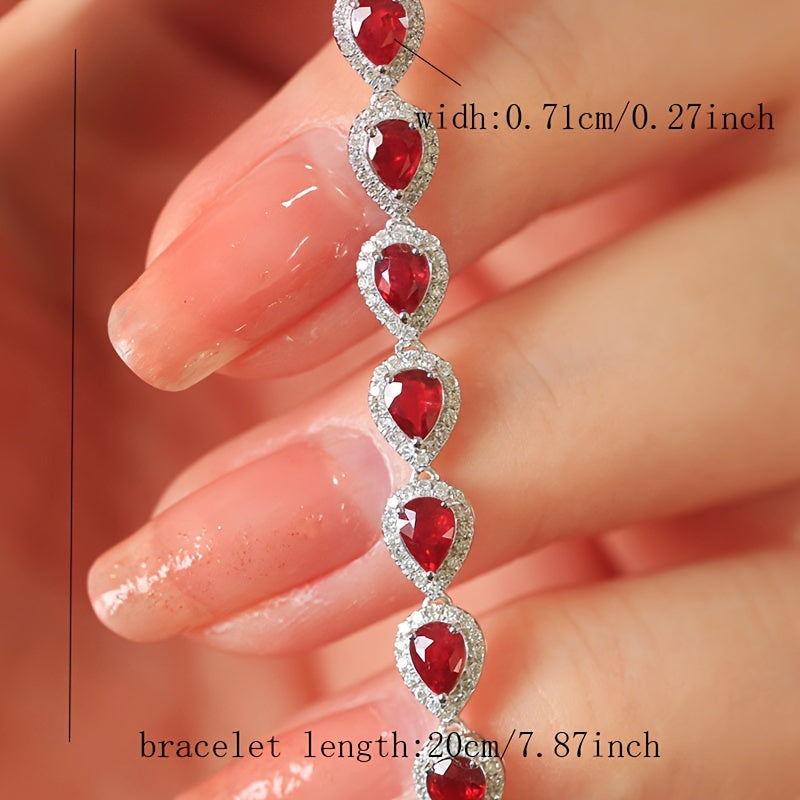 Stylish Sterling Silver Bracelet with Synthetic Red Gemstones and Celestial Theme, featuring zirconia Mosaic. This 925 Silver Plated Jewelry makes a perfect gift for December birthdays, special occasions, or Valentine's Day. A versatile fashion accessory