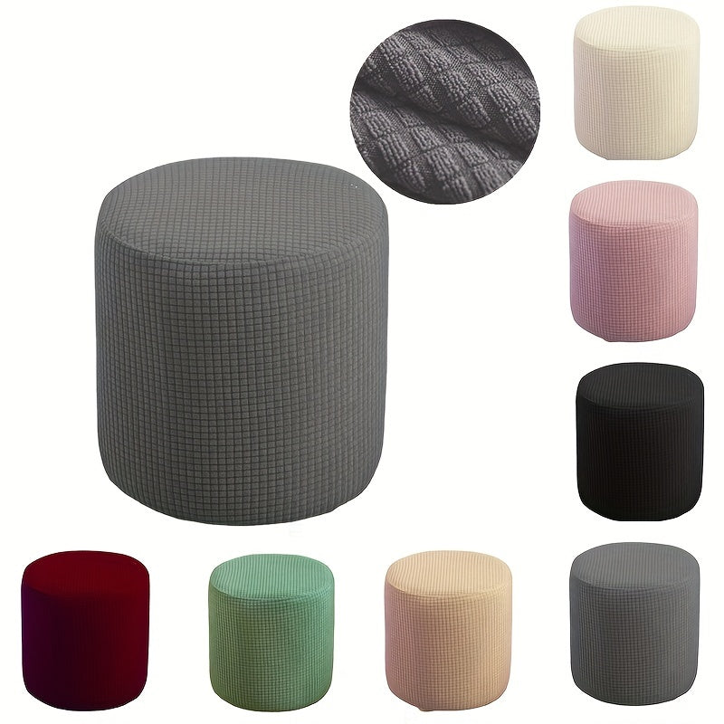 Stretchable round footstool cover made from soft polyester blend with elastic fit. Available in multiple colors, machine washable, modern design for living room ottomans.