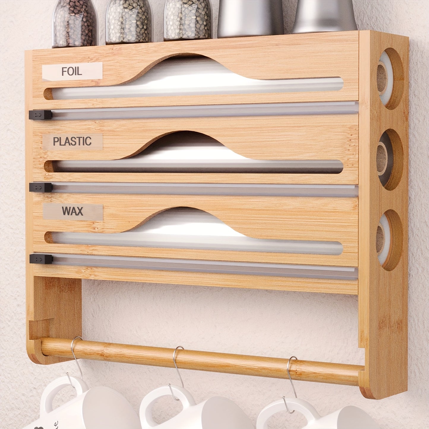 Bamboo wrap organizer with cutter and labels for wall-mounted kitchen storage.