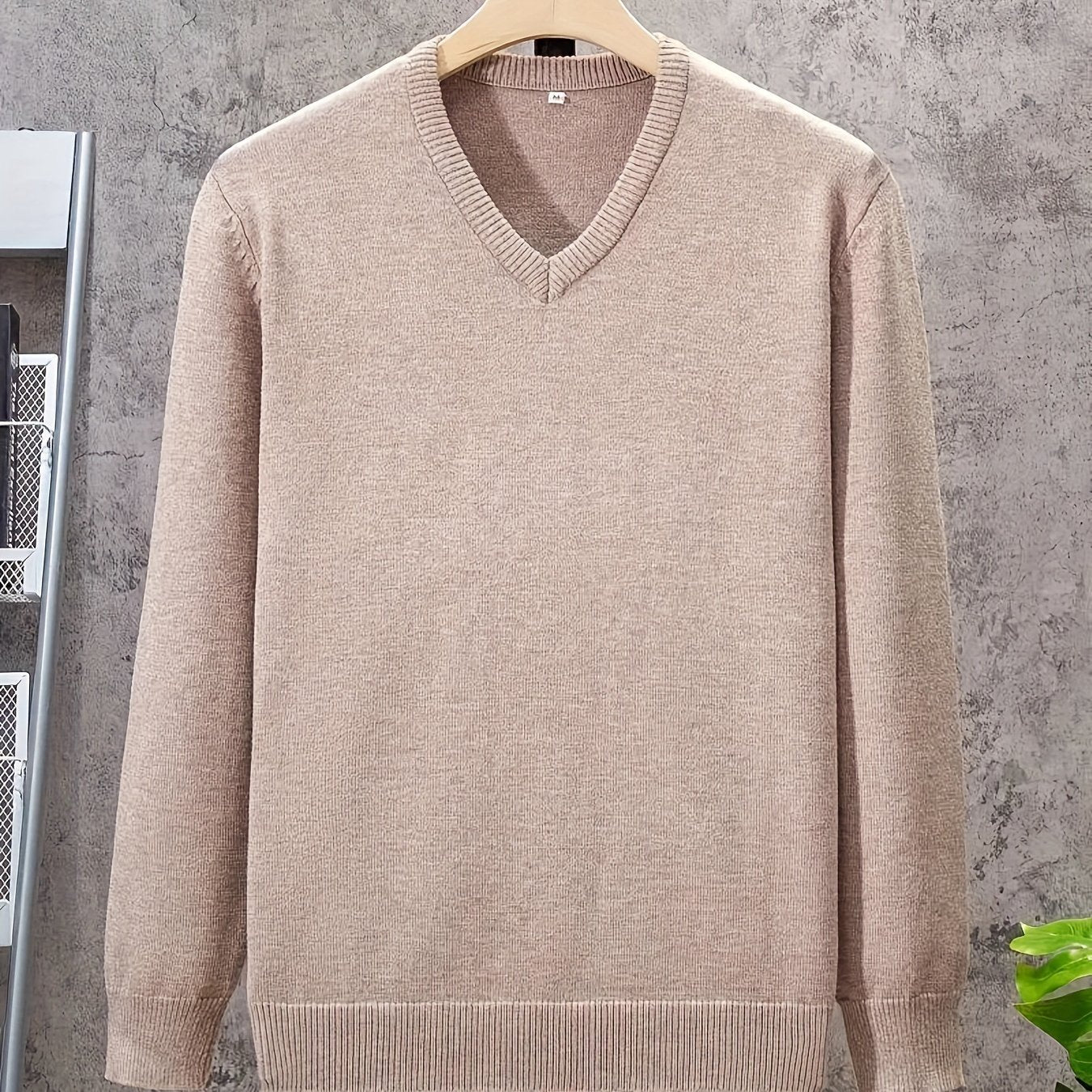 Men's V-Neck Knit Sweater for 2024 Autumn/Winter with solid color design and regular fit. Made from Polyester 25%, Viscose 50%, Nylon 25%.