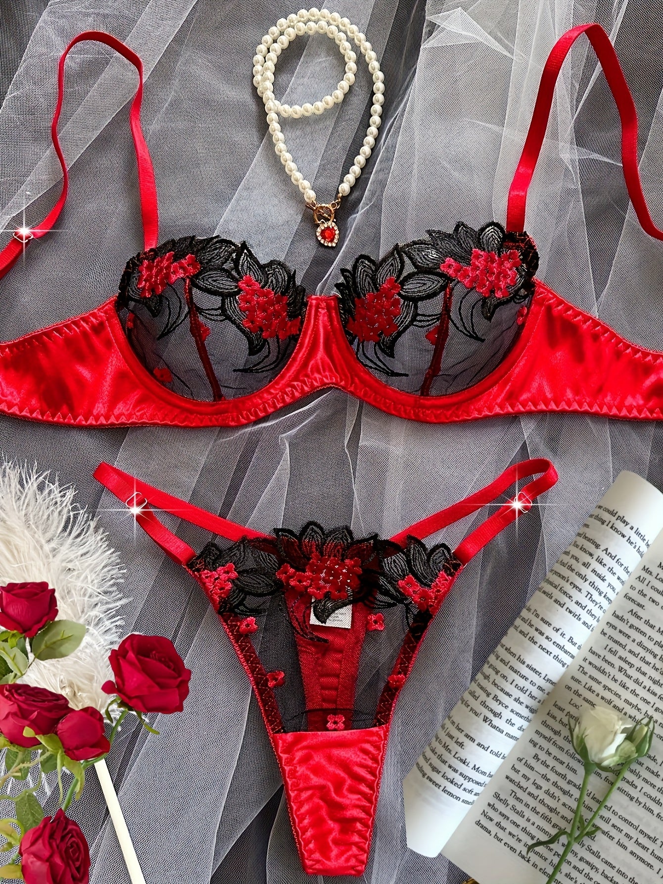 Floral embroidered mesh bra and panty set with medium support. Made of 95% polyester and 5% elastane. Perfect for dating and parties.