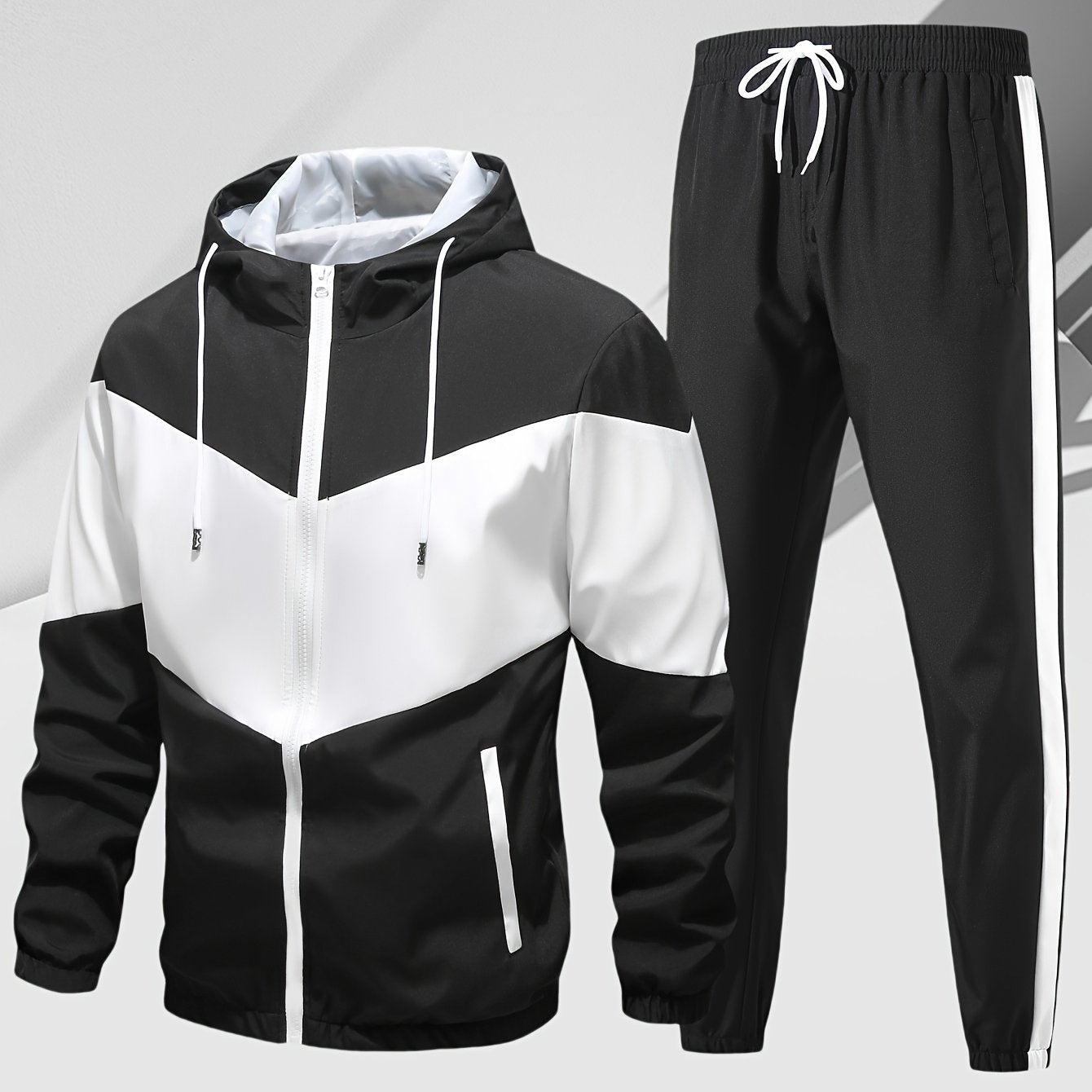 Men's casual 2-piece outfit with a stylish color block zip up hooded jacket and breathable drawstring pants.